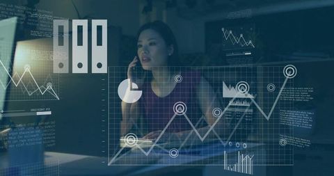 Businesswoman engaging with data analytics via technology tools