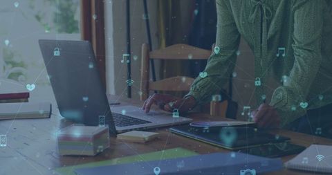 Woman Using Laptop with Digital Network Overlay