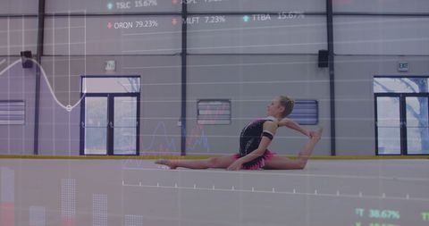 Caucasian Female Gymnast in Arena with Financial Data Overlay - Download Free Stock Images Pikwizard.com