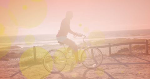 Woman Riding Bicycle on Beach Track During Sunset - Download Free Stock Images Pikwizard.com