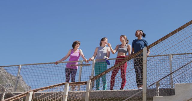 Diverse Group Relaxing After Outdoor Workout on Sunny Day - Download Free Stock Images Pikwizard.com