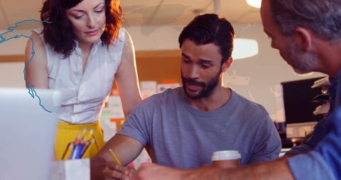 Diverse Team Discussing Global Business Strategies with World Map Overlay