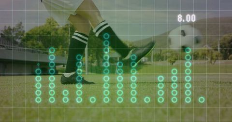 Soccer Player Analyzing Fitness Data for Performance Improvement