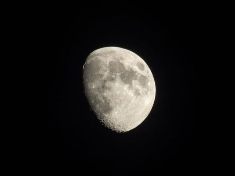 Detailed Waxing Gibbous Moon Against Black Sky