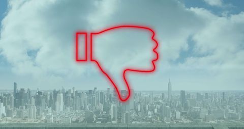 Red thumbs down overlay on cityscape skyline background