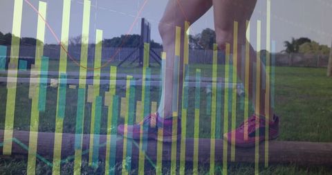 Midadult woman balancing on wooden log with fitness data overlay, outdoor backyard workout