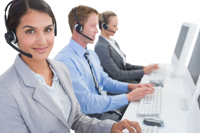 Transparent call center team working on computers with headsets providing customer service - Download Free Stock Videos Pikwizard.com