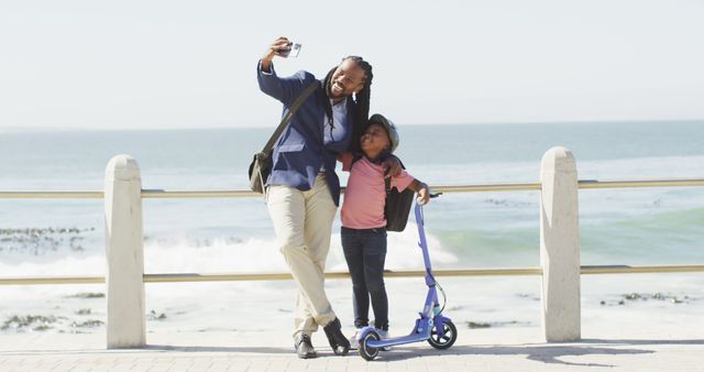 Father and Daughter Taking Selfie by the Sea - Download Free Stock Images Pikwizard.com