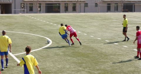 Intense youth soccer match with energetic field action