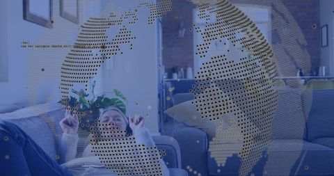Relaxing with Headphones and Smartphone in Loft Living Room with Digital AR Globe Overlay