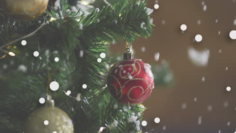 Snow Falling on Festive Christmas Tree with Decor