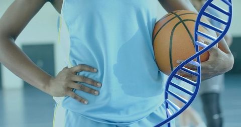 Youth Basketball Player Holding Ball with DNA Strand Illustrating Sports Genetics and Performance