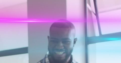 Cheerful African American Male Teacher with Light Streaks Effect