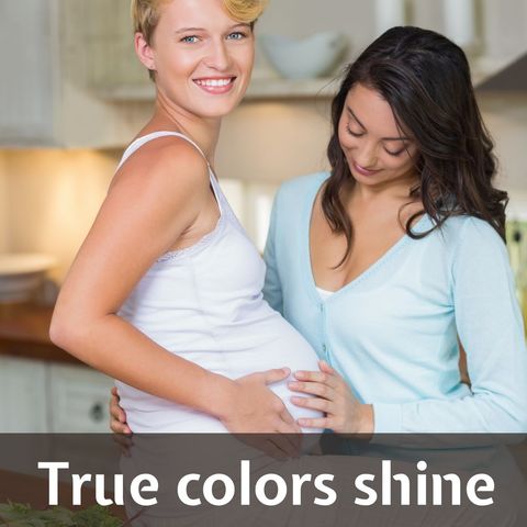 Loving Couple Embracing Pregnancy at Home