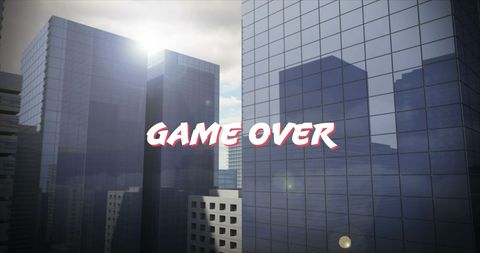 Game Over Text on Modern Skyscraper Cityscape