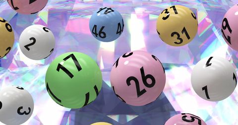 Colorful lottery balls over vibrant crystal background