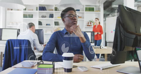 Diverse Team Processing Financial Data in Modern Office