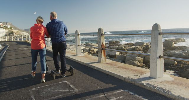 Senior Couple Enjoying a Stroll by the Ocean - Download Free Stock Images Pikwizard.com