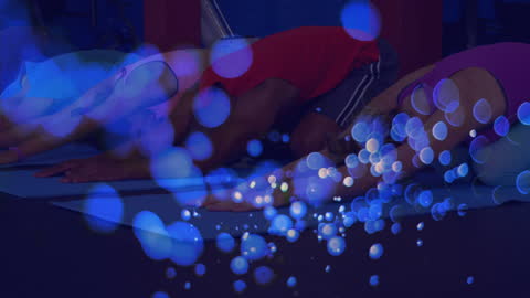 Group Yoga Practice with Ethereal Blue Bubbles in Gym Environment
