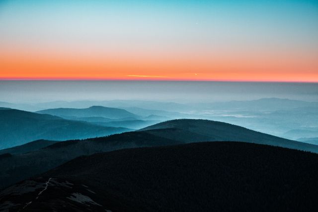 Stunning Mountain Range at Sunrise with Vibrant Sky - Download Free Stock Photos Pikwizard.com