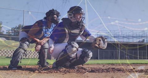 Baseball Catchers on Field Emphasizing Teamwork and Concentration