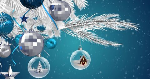 Elegant White Christmas Tree with Ornaments and Snowy Background
