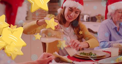 Family Celebrating Christmas with Santa Hats and Festive Overlay
