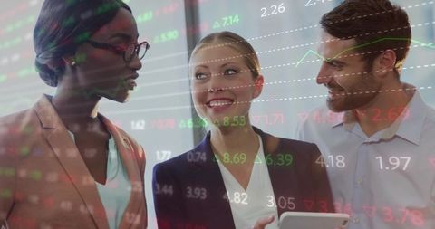 Business professionals collaborate on financial data with tablet in hand