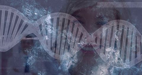 Overlaying translucent dna helix on abstract blue-gray marbled background with faint face
