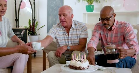 Senior Friends Celebrating Together with Coffee and Cake