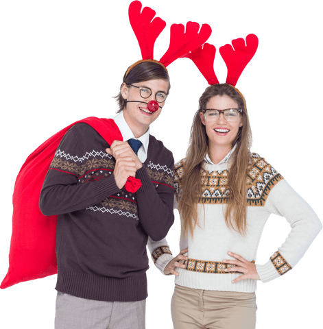 Smiling Couple with Reindeer Horns Standing in Christmas Attire