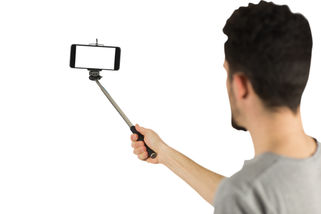 Casual Man Using Selfie Stick Isolated on Transparent Background - Download Free Stock Videos Pikwizard.com