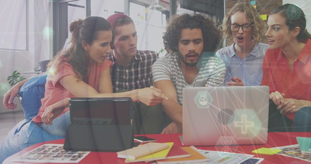 Team Collaborating on Laptop in Modern Office Space - Download Free Stock Images Pikwizard.com