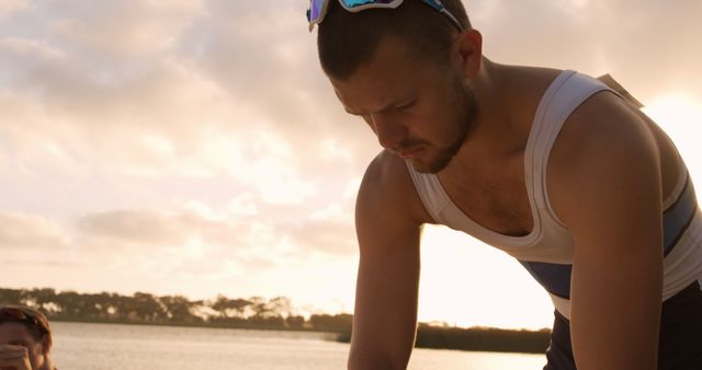 Rower Preparing to Launch Boat at Sunset - Download Free Stock Images Pikwizard.com