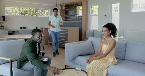 Financial Consultant Meeting Diverse Couple at Home