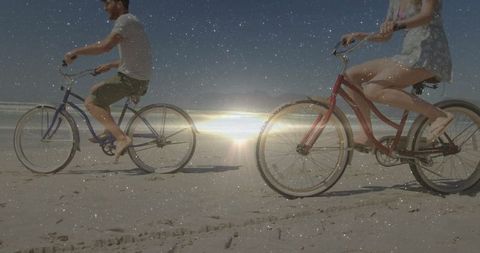 Romantic Beach Cycling Adventure at Sunset