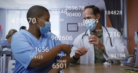 Healthcare Professionals Utilizing Data in Modern Hospital Environment