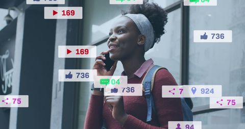 African American Woman Engaged with Social Media Icons