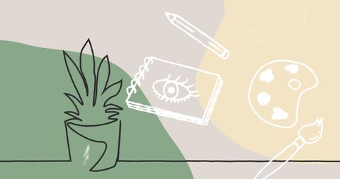 Creative drawing themed background with art supplies and plant