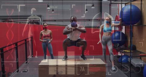 Diverse group training in gym with digital health analytics overlay