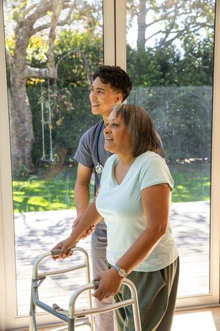 Senior Patient Receiving Friendly Care at Home