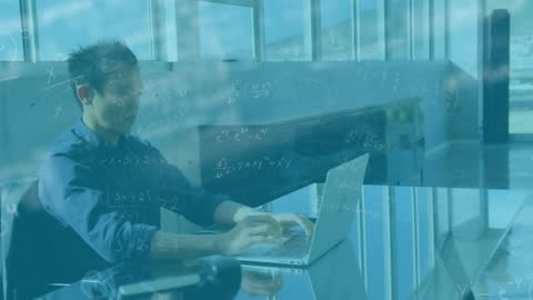 Businessman Innovating with Digital Data Overlay in Modern Office