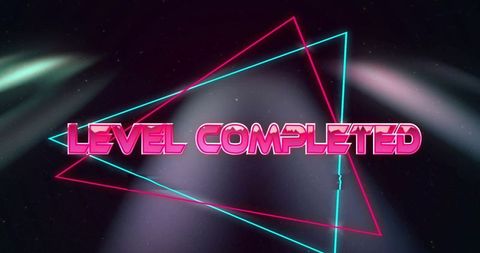 Neon pink 'level completed' text on futuristic digital background