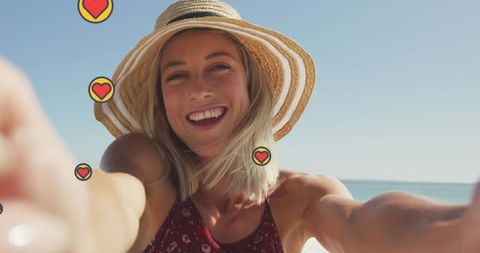Smiling Woman Captures Fun Moments at Sunny Beach