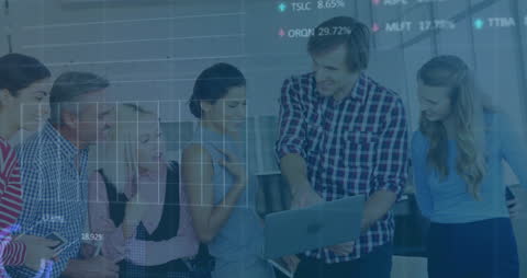 Team Discussing Financial Data Analysis with Overlay