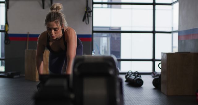 Focused Woman in Gym Lifting Weights - Download Free Stock Images Pikwizard.com