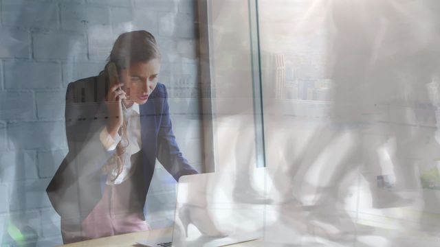 Video shows businesswoman communicating on smartphone while working on laptop, overlaid with city skyline and moving people. Ideal for concepts related to multitasking, urban lifestyle, modern business, technology integration, and dynamic professional environments.