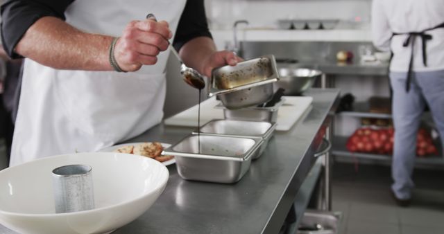 Chef Preparing Sauce in Professional Kitchen - Download Free Stock Images Pikwizard.com