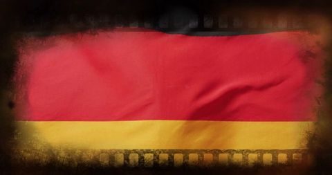 Vintage grunge red over yellow fabric flag with filmstrip border, vignette and wrinkles