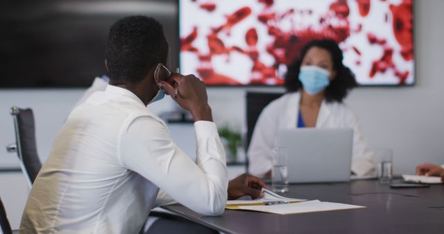 Patient Consulting with Doctor in Modern Clinic Wearing Face Masks for Safety - Download Free Stock Images Pikwizard.com